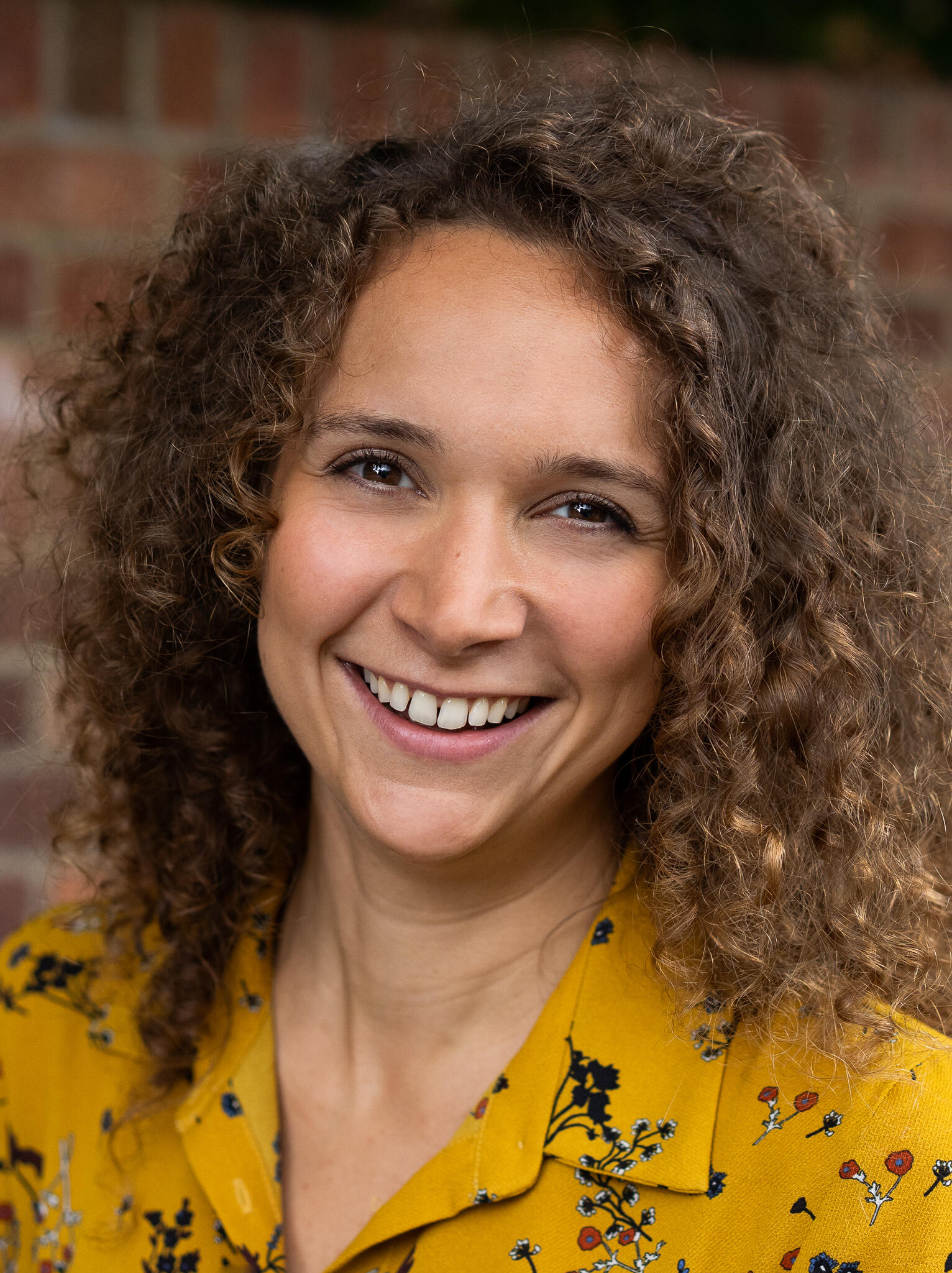 Picture of me smiling Engaging smileshowing that I am looking forward to working with clients, in a gentle compassionate way